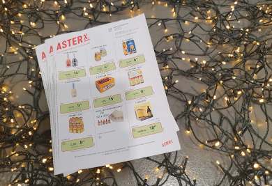 Kerstfolders van AsterX Dranken op kerstlampjes